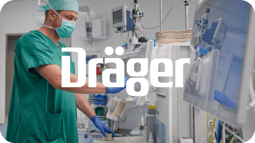 Medical professional using a touchscreen device in a hospital environment, Dräger logo overlay.